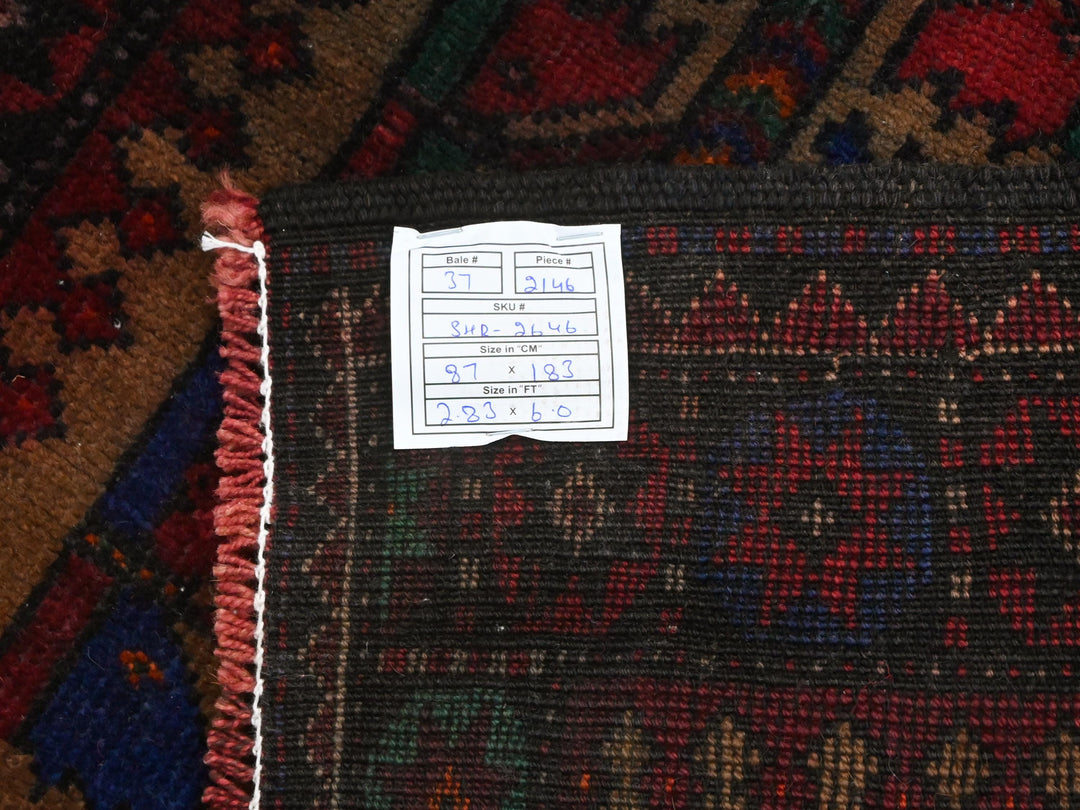 a close up of a rug with a tag on it