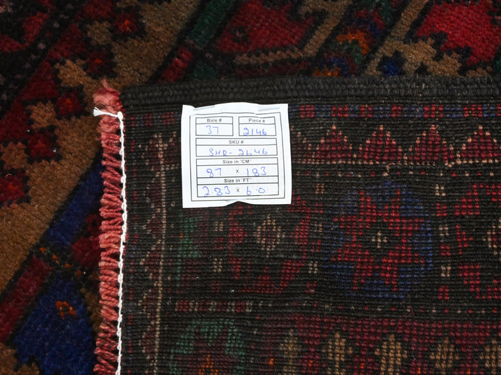 a close up of a rug with a tag on it