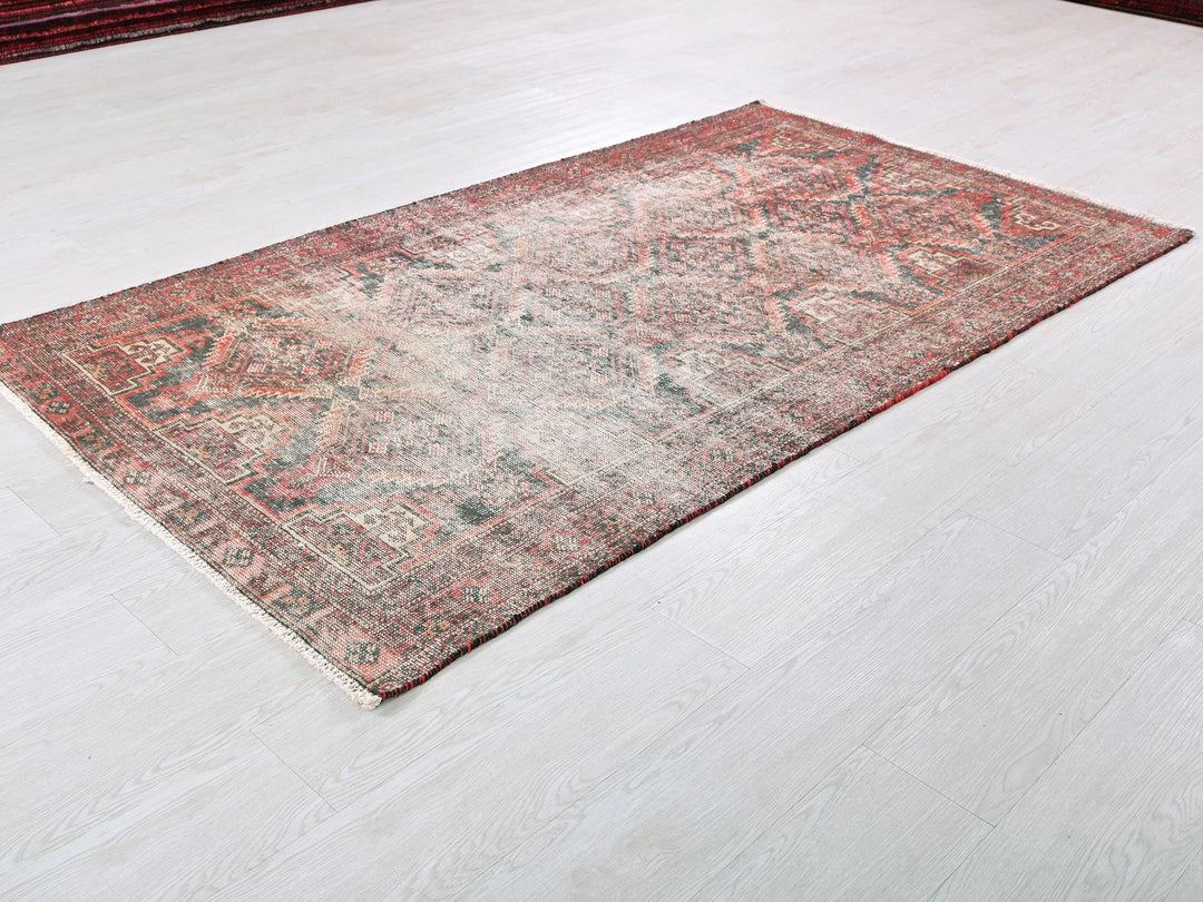 a rug on a white floor in a room