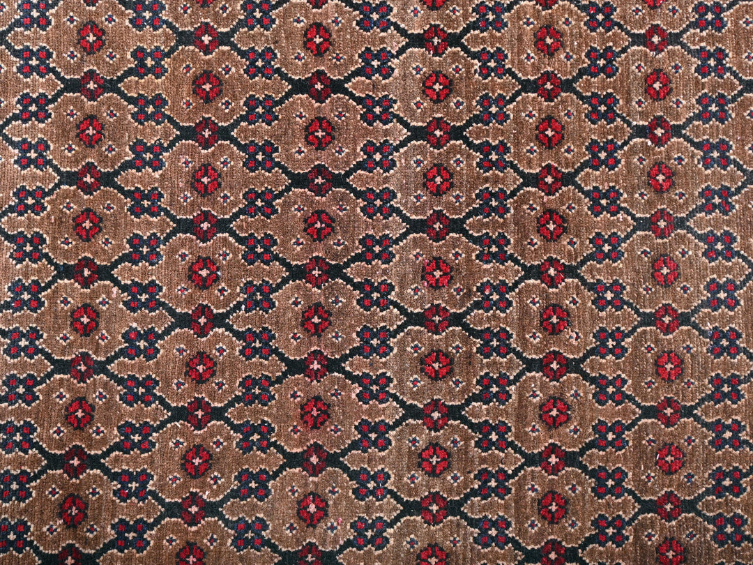 a close up of a red, blue, and brown rug