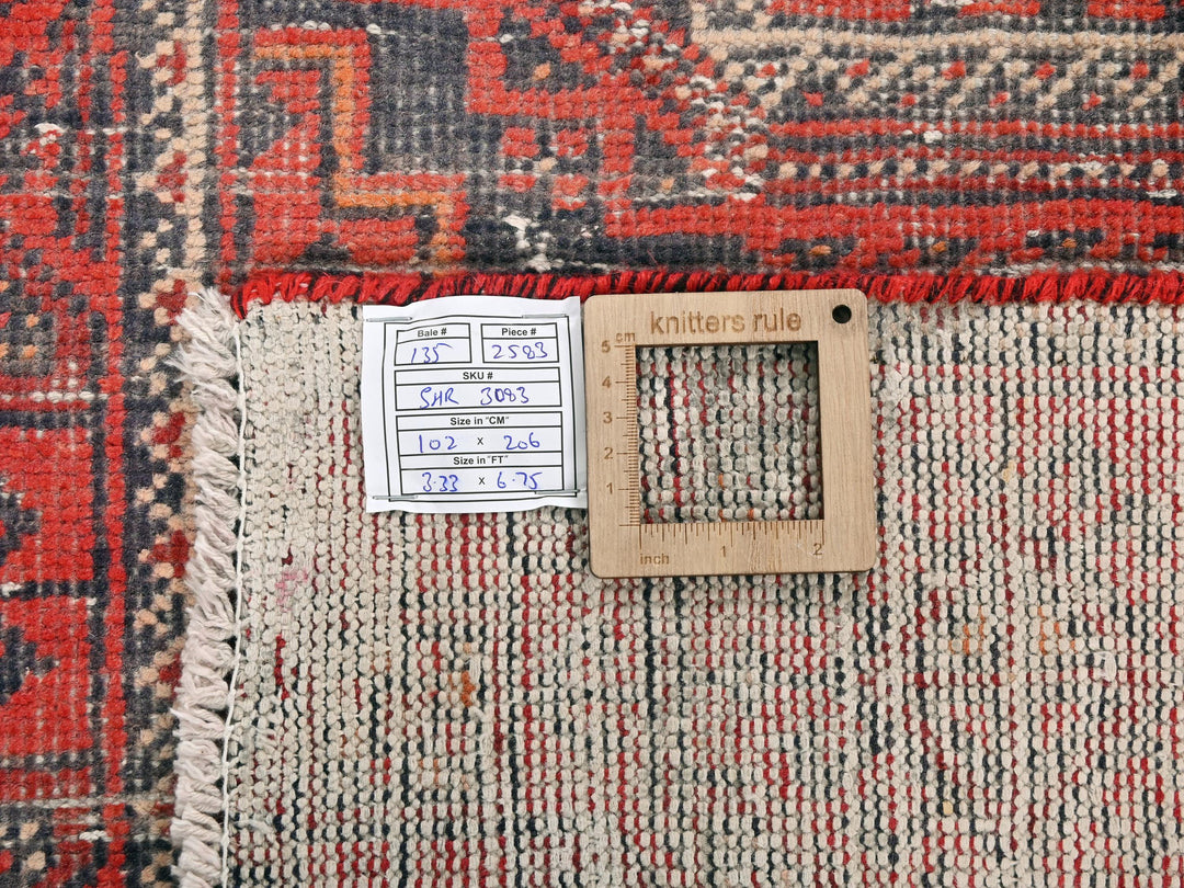 a piece of wood sitting on top of a rug