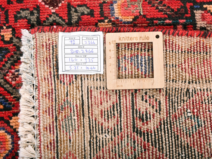 a piece of cloth with a ruler on top of it
