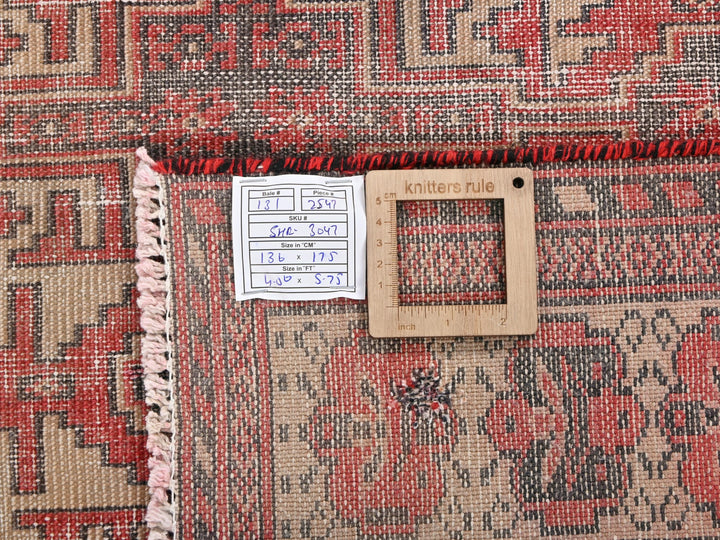 a picture frame on a rug with a name tag on it