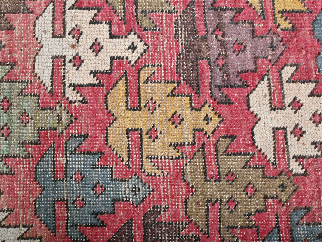 a close up of a rug with many different colors
