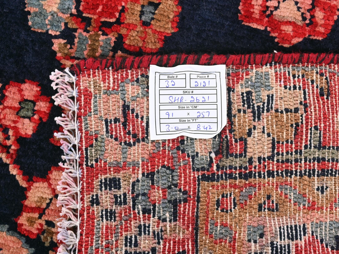 a close up of a rug with a tag on it