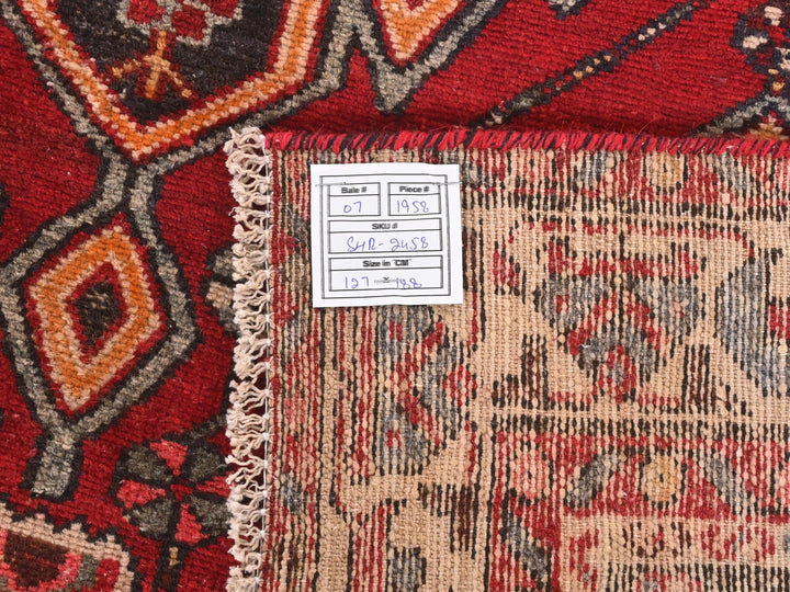 a close up of a rug with a tag on it