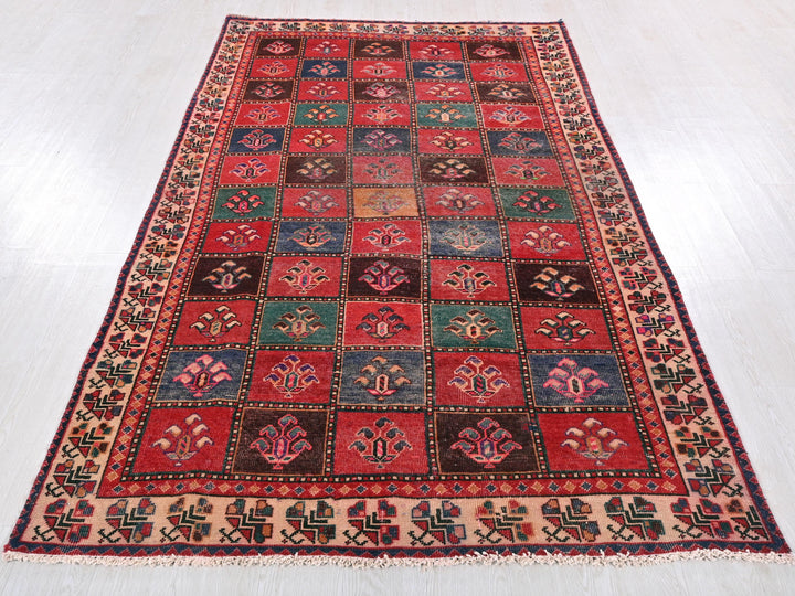 a multicolored rug on a white floor