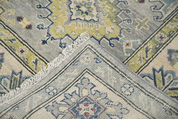 gray Medium rug 5' 5" x 7' 9"