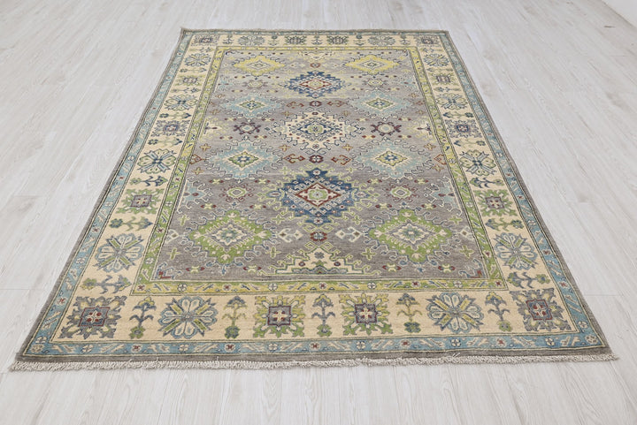 gray Medium rug 5' 5" x 7' 9"