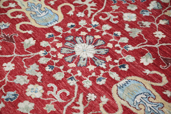 red Medium rug 6' 1" x 8' 10"