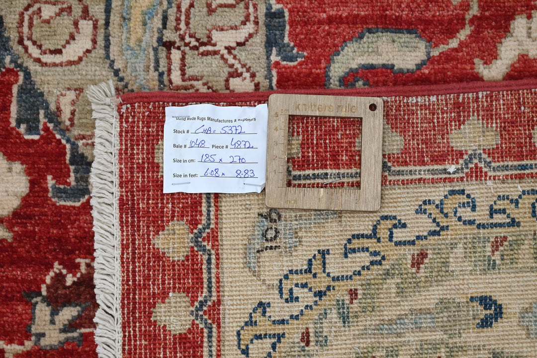red Medium rug 6' 1" x 8' 10"