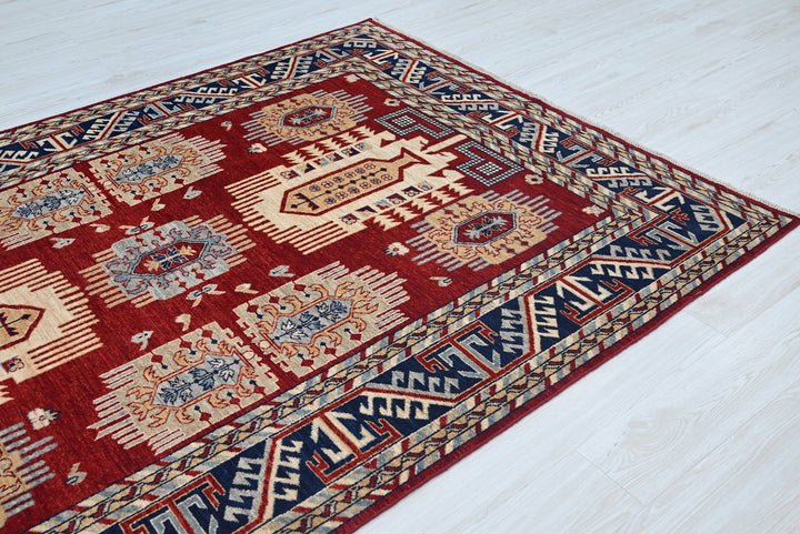 red Medium rug 5' 7" x 8' 2"