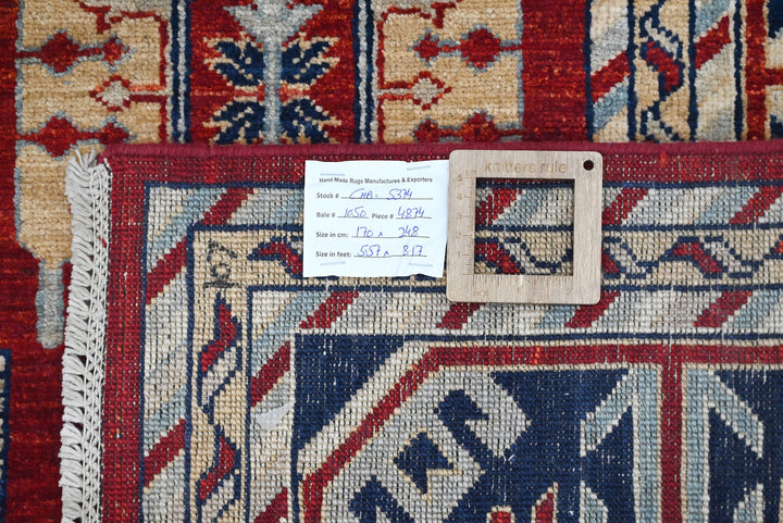 red Medium rug 5' 7" x 8' 2"