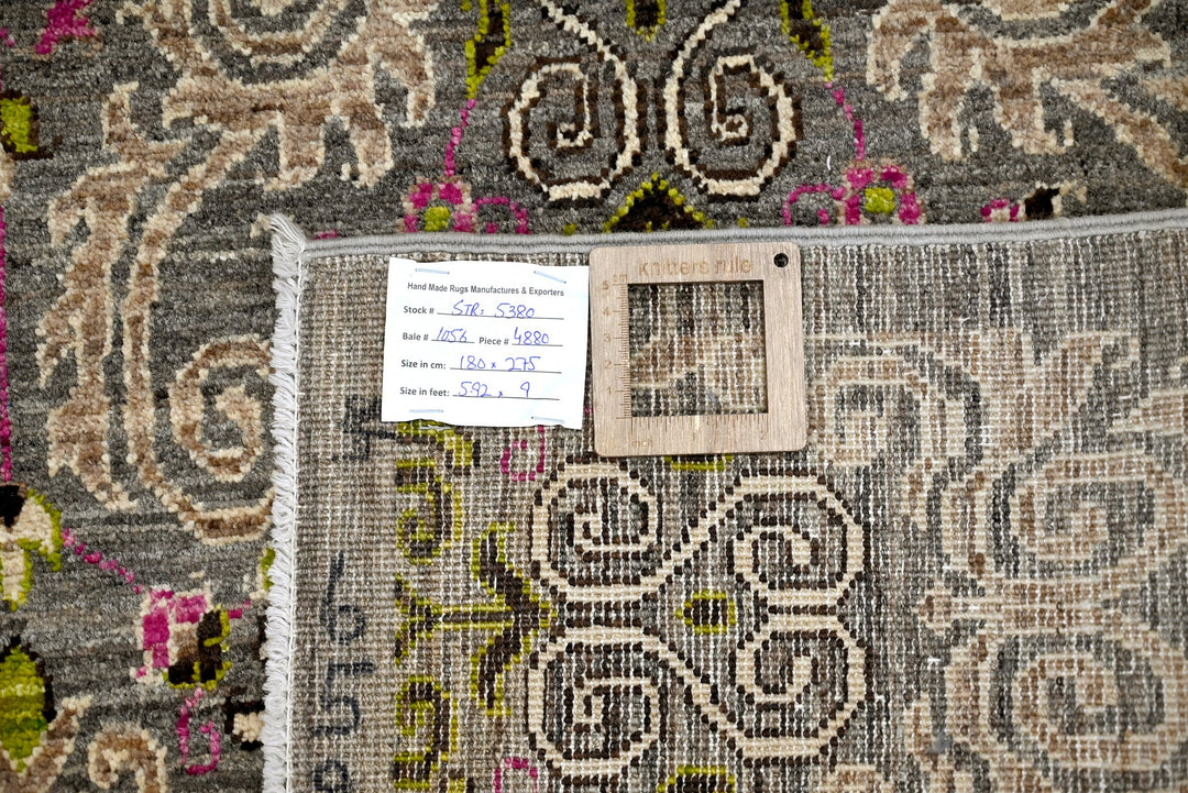gray Medium rug 5' 11" x 9' 0"