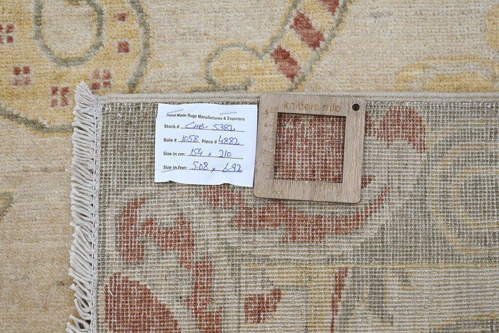 brown Medium rug 5' 1" x 6' 11"