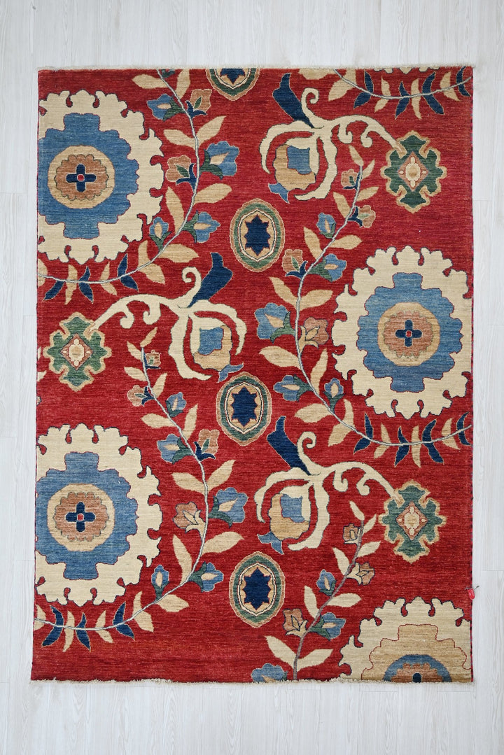 red Medium rug 5' 7" x 7' 6"