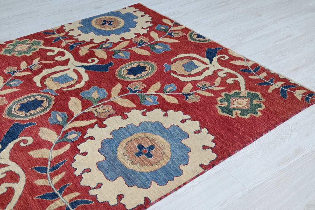 red Medium rug 5' 7" x 7' 6"