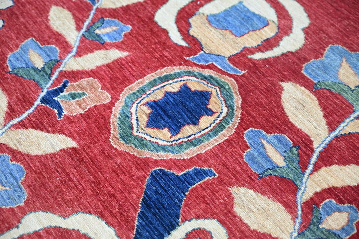 red Medium rug 5' 7" x 7' 6"