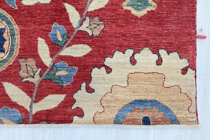 red Medium rug 5' 7" x 7' 6"
