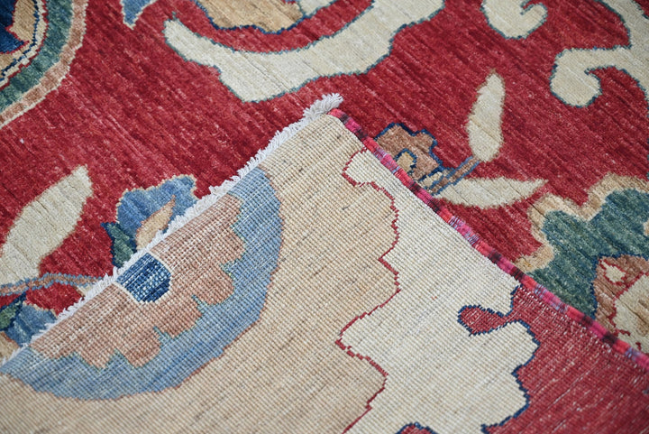 red Medium rug 5' 7" x 7' 6"