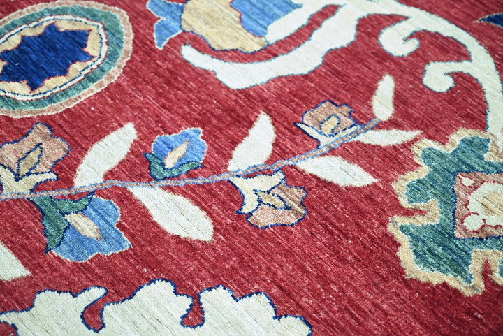red Medium rug 5' 7" x 7' 6"
