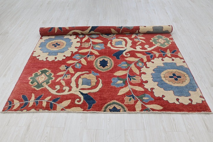 red Medium rug 5' 7" x 7' 6"