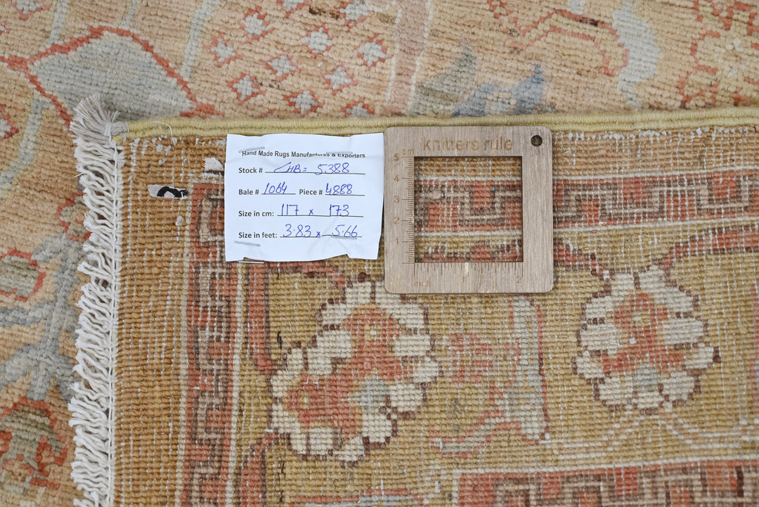 brown Accent rug 3' 10" x 5' 8"