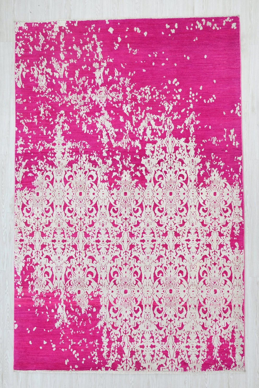 pink Medium rug 6' 2" x 9' 0"