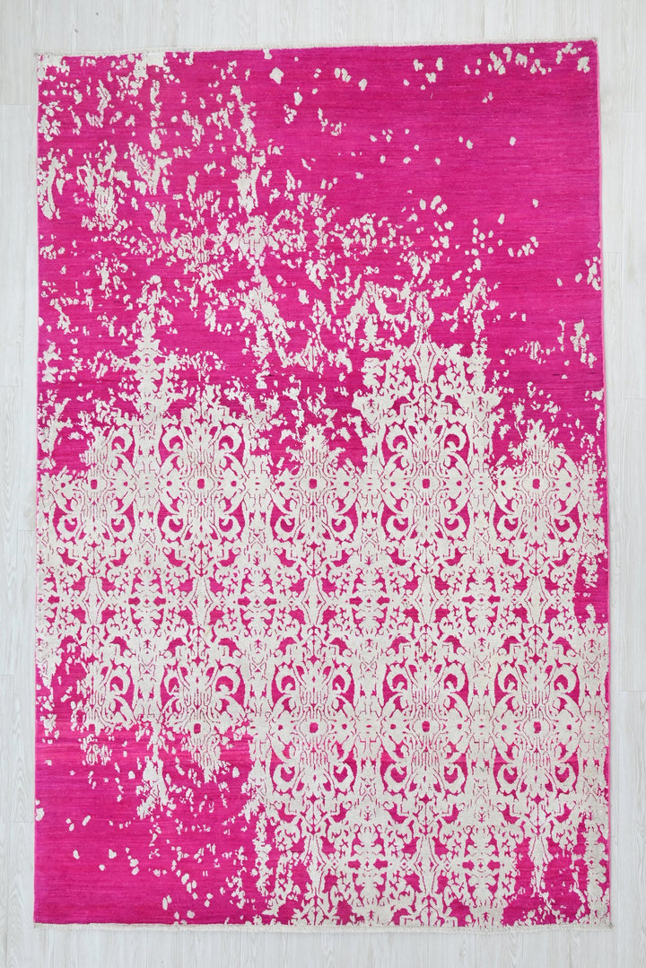 pink Medium rug 6' 2" x 9' 0"