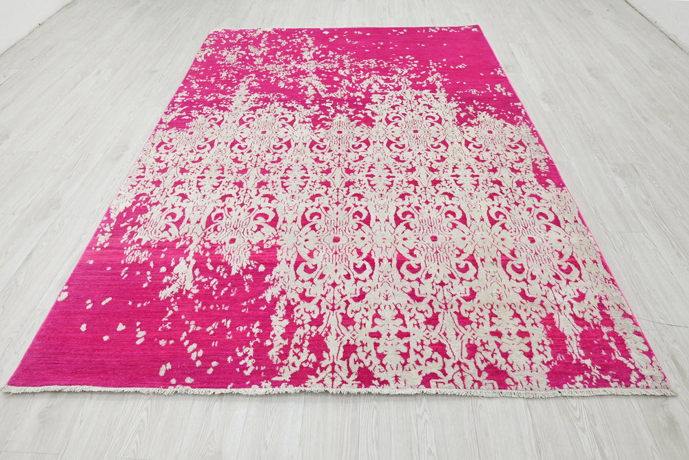 pink Medium rug 6' 2" x 9' 0"