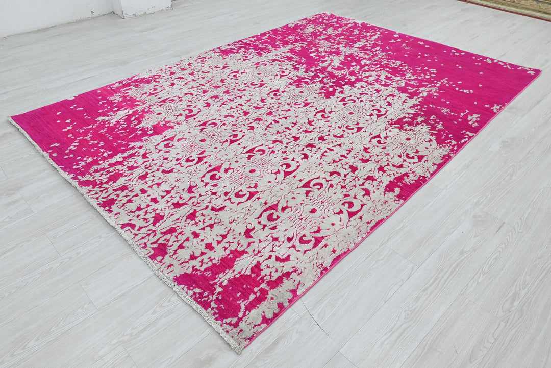 pink Medium rug 6' 2" x 9' 0"