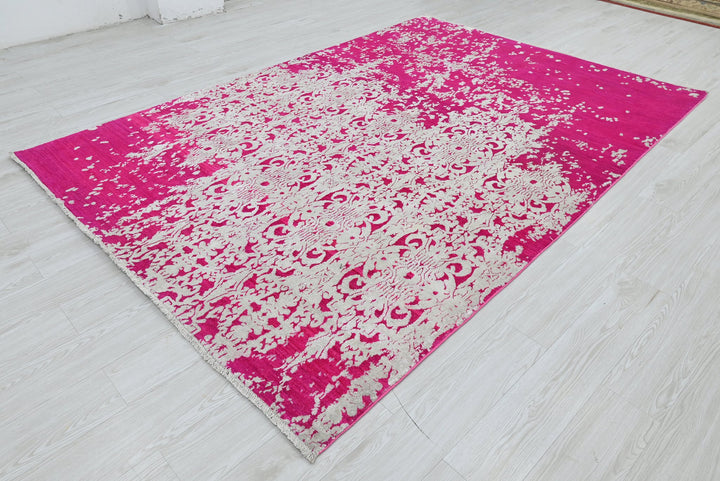 pink Medium rug 6' 2" x 9' 0"