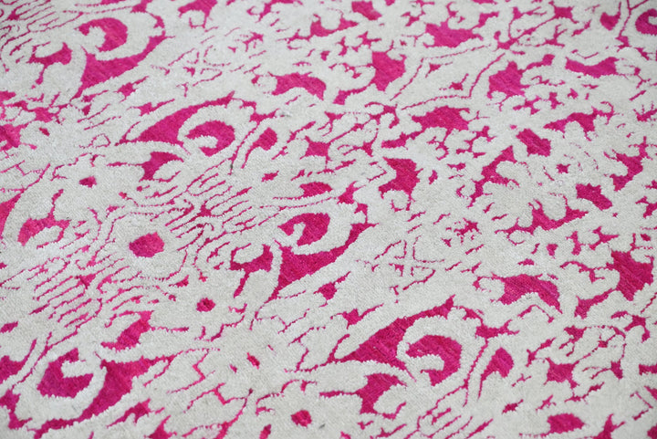 pink Medium rug 6' 2" x 9' 0"