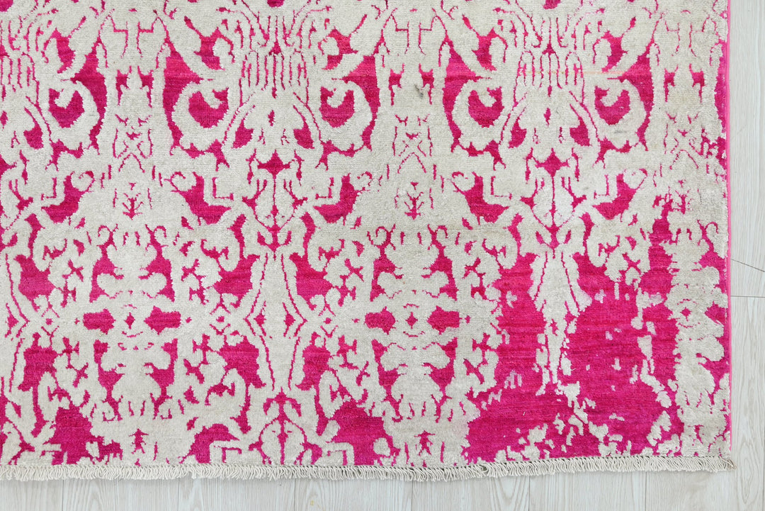 pink Medium rug 6' 2" x 9' 0"