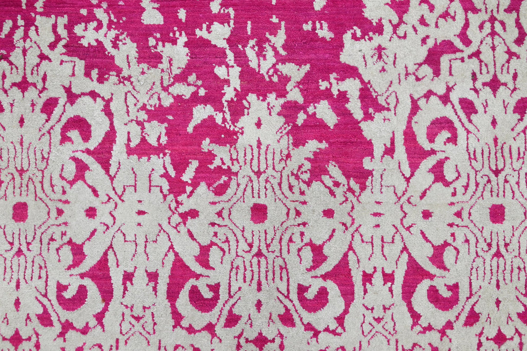 pink Medium rug 6' 2" x 9' 0"