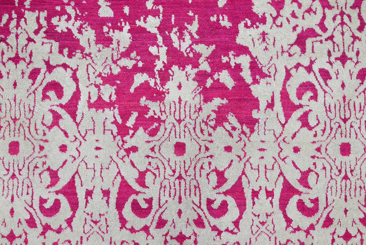 pink Medium rug 6' 2" x 9' 0"