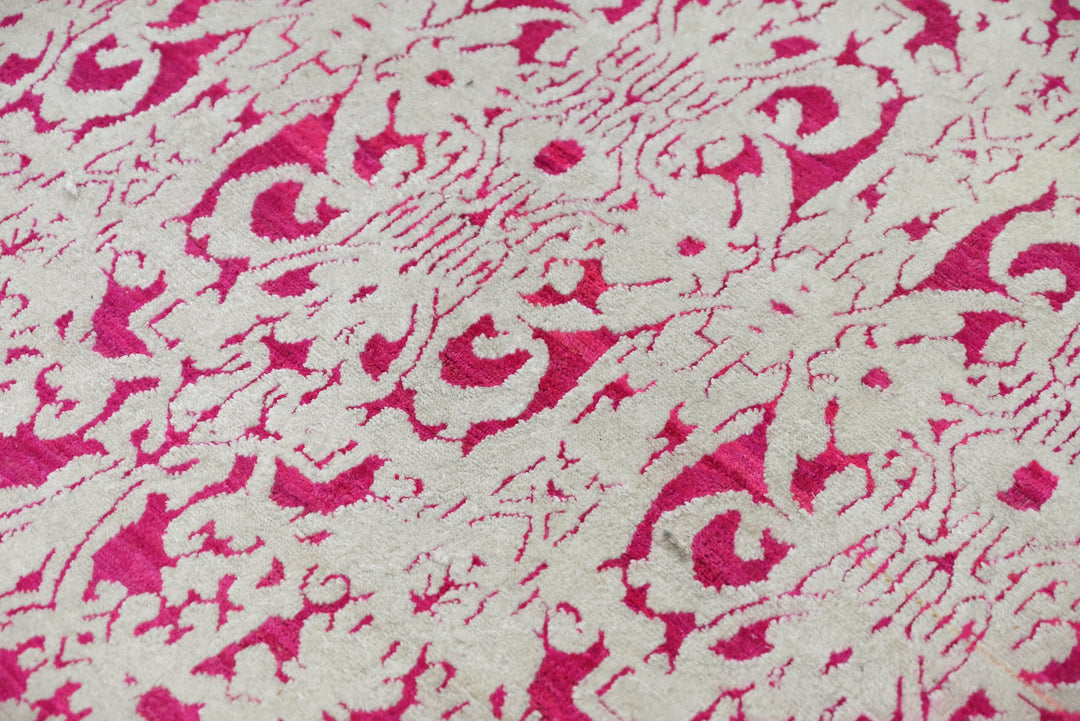 pink Medium rug 6' 2" x 9' 0"