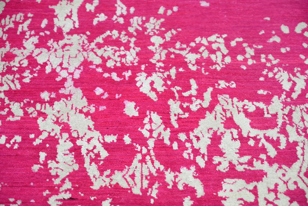pink Medium rug 6' 2" x 9' 0"
