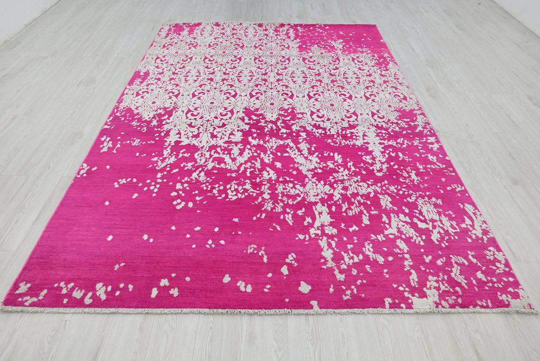 pink Medium rug 6' 2" x 9' 0"