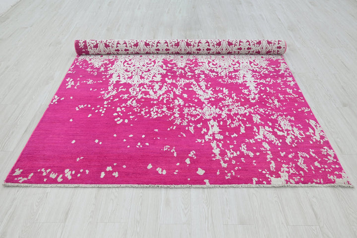 pink Medium rug 6' 2" x 9' 0"