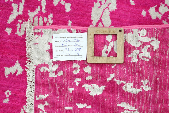 pink Medium rug 6' 2" x 9' 0"