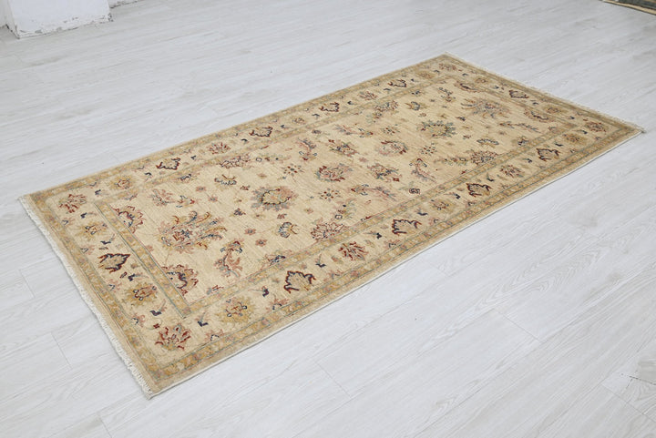 brown Accent rug 3' 3" x 6' 4"