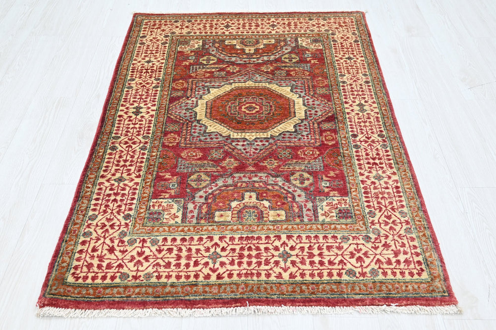 red Accent rug 3' 4" x 5' 2"