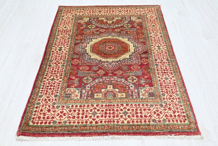 red Accent rug 3' 4" x 5' 2"