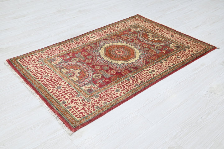 red Accent rug 3' 4" x 5' 2"