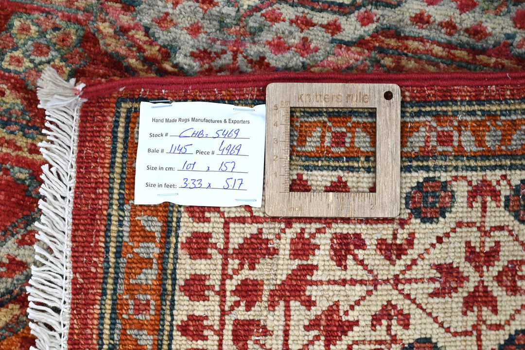 red Accent rug 3' 4" x 5' 2"