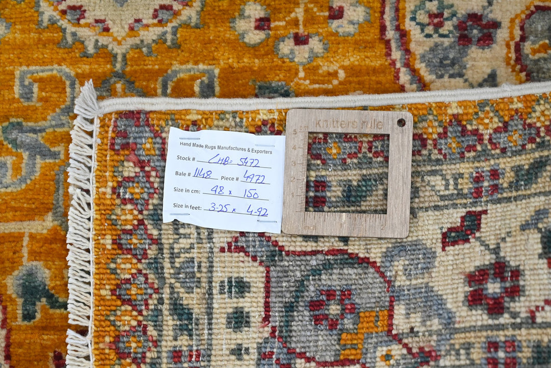 orange Accent rug 3' 3" x 4' 11"