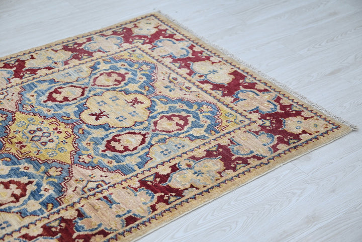 red Accent rug 3' 2" x 4' 10"