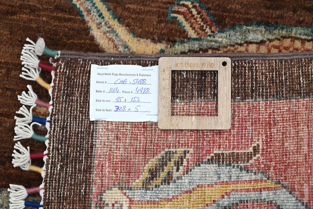 brown Accent rug 3' 1" x 5' 0"