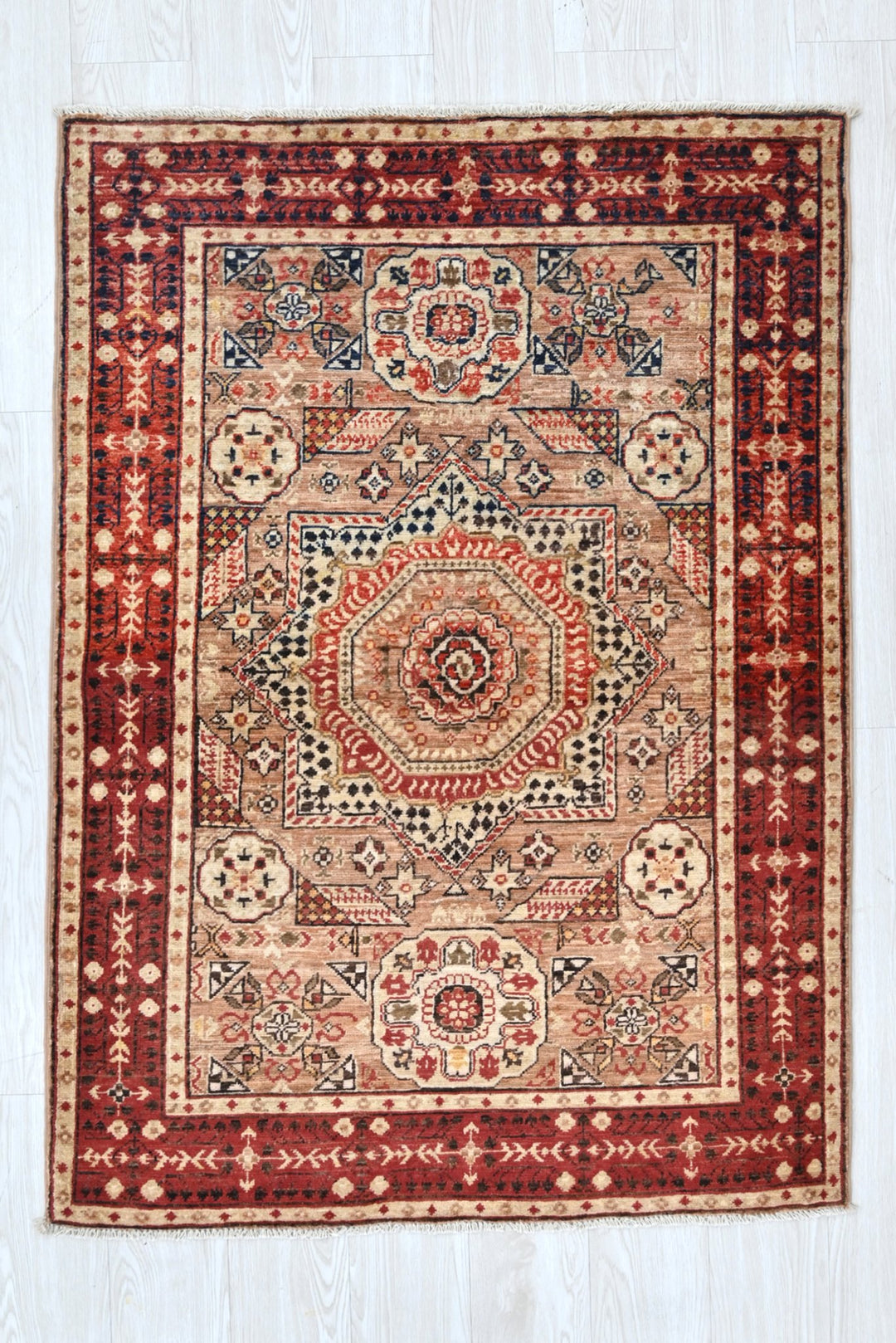 brown Accent rug 3' 4" x 4' 10"